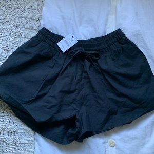 black paper bag shorts